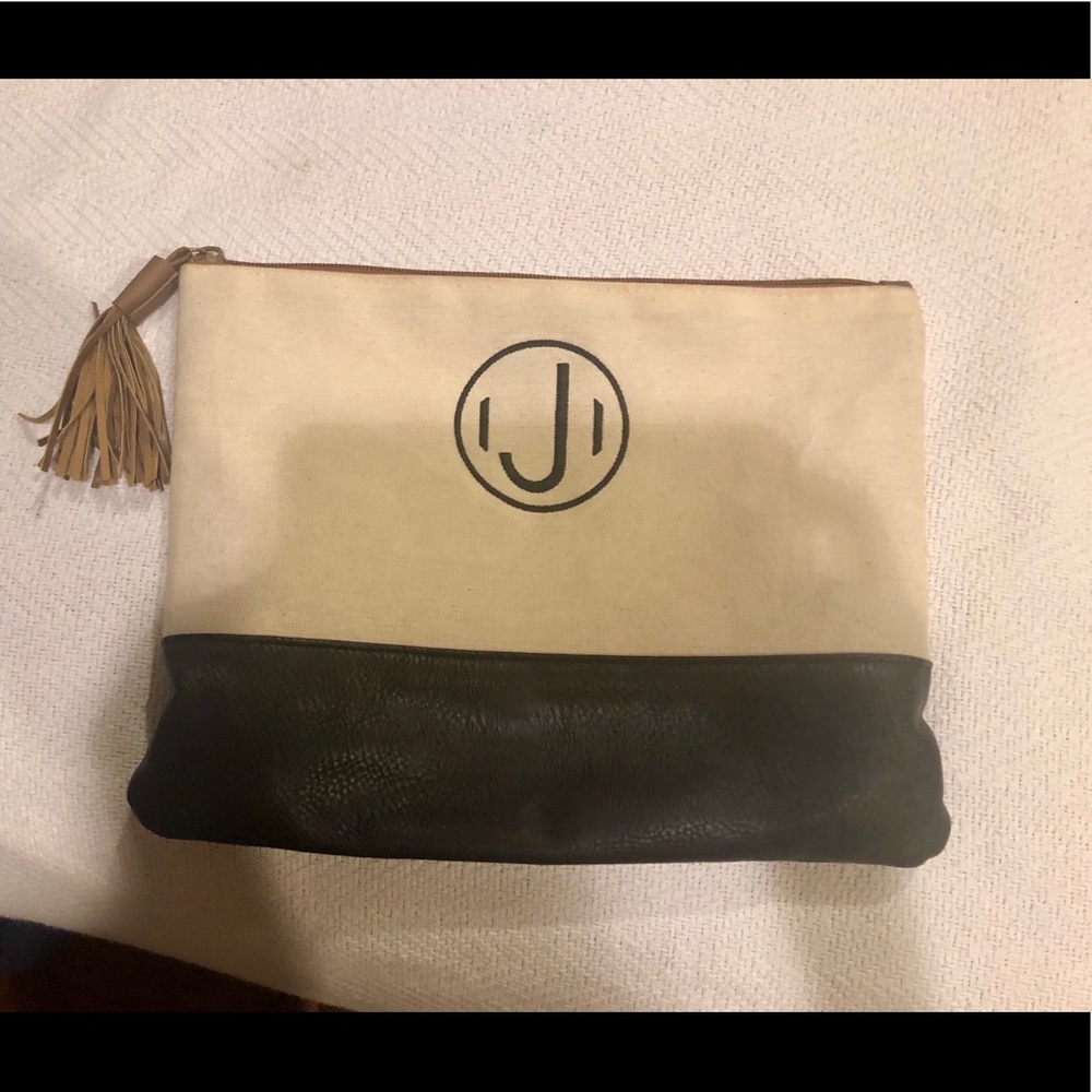 Tasseled zipper pouch- multipurpose